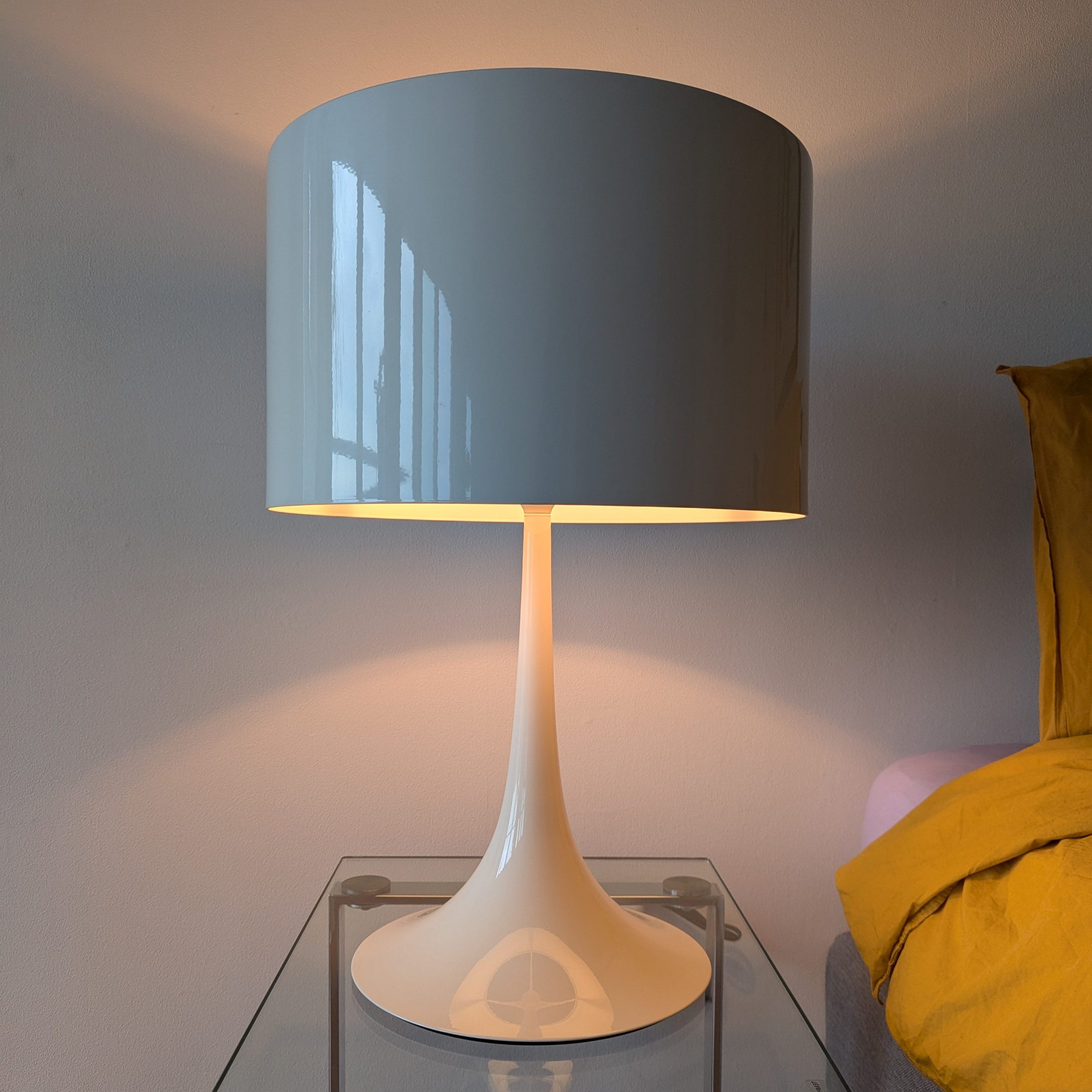 Flos ‘Spun Light T1’ Table Lamp: “Flos ‘Spun Light T1’ table lamp designed by Sebastian Wrong, showcasing a modern, spun metal frame with a glossy finish and a matching shade.”