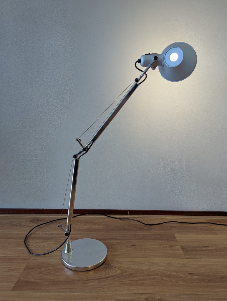 Artemide ‘Tolomeo Mini’ Table Lamp: “Artemide Tolomeo Mini table lamp designed by Michele De Lucchi and Giancarlo Fassina in 1986, featuring adjustable aluminum arms and a modern design.”